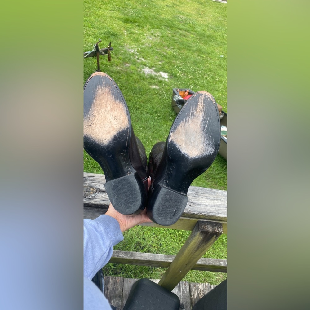 Size 11 men’s Black Cherry Lucchese boots, very minor wear on outsole (bottom)